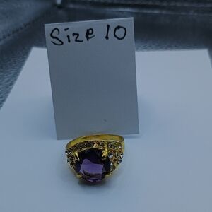 Elegant Gold and Purple Gemstone Ring